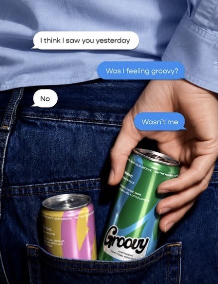 Groovy cans tucked into a back jeans pocket with playful text bubbles